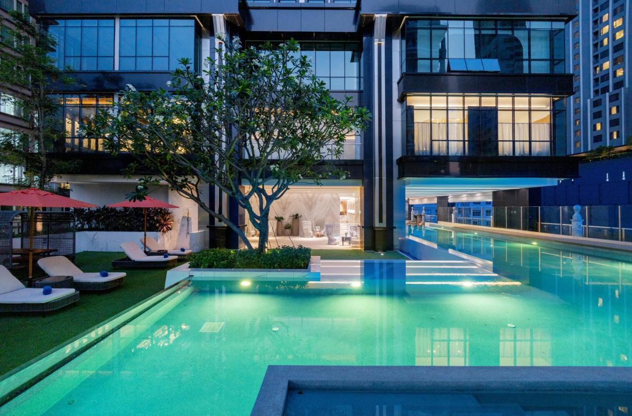 Silq Hotel & Residence, Managed By The Ascott Limited Bangkok Exterior foto The swimming pool at the hotel