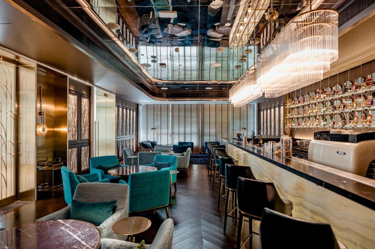 Silq Hotel & Residence, Managed By The Ascott Limited Bangkok Exterior foto The bar at the 100 Queen's Gate